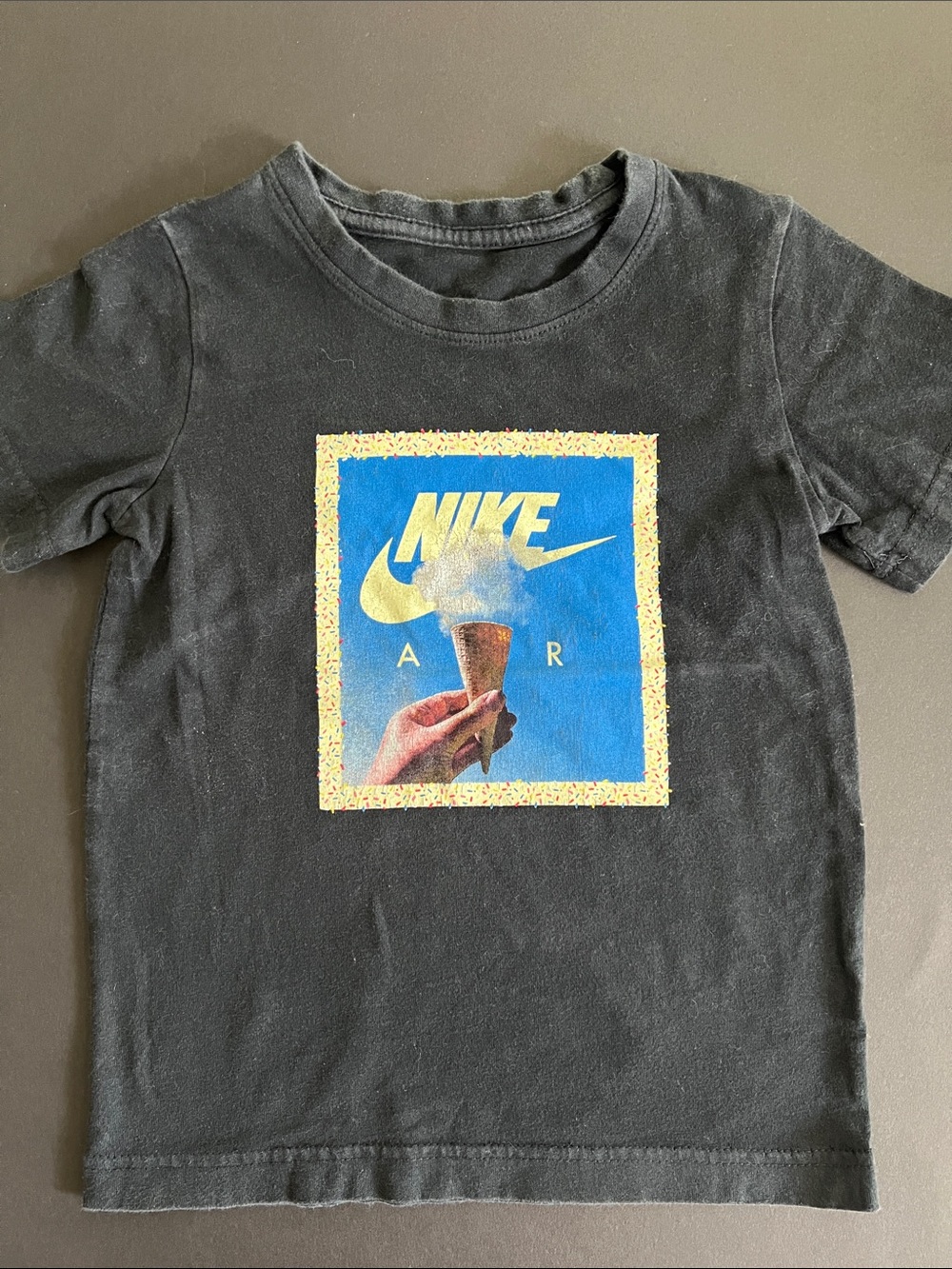 Nike Black Tee with Blue and Yellow Graphic